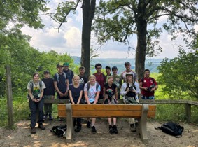 On Thursday we went to Shawnee park to teach the students about the mounds there and the history of the Native Americans such as Hopewell and Shawnee. We also saw a lot of fruiting Pawpaw trees. After this, we went to Carriage House Farm to see their garden, try some homemade honey, and see the compost piles. 